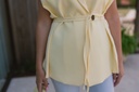 Pastel yellow vest button strap