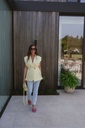 Pastel yellow vest button strap